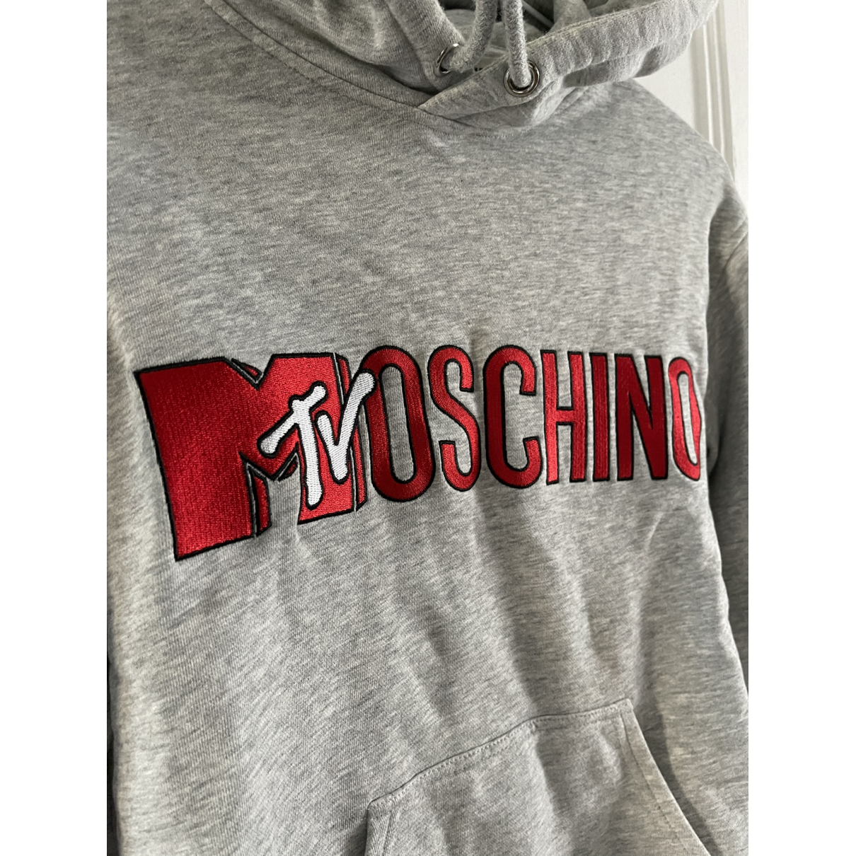 grey moschino hoodie